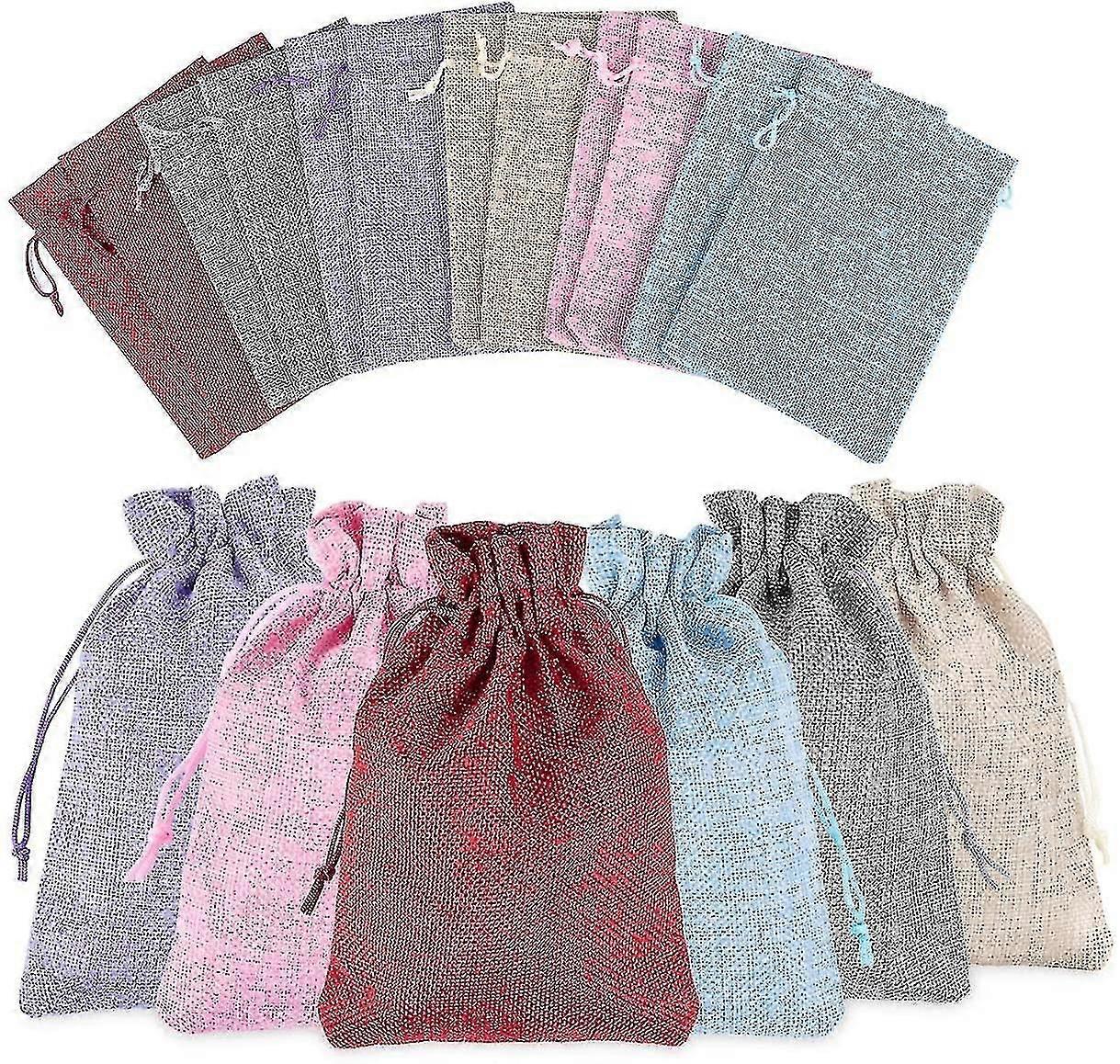 حقائب الجوت 36 قطعة حقائب طبيعية ملونة مع رباط تضييق حقيبة جوت 13 × 18 سم أكياس قماش لملء أكياس الكتان لمجيء التقويم مجوهرات صالح