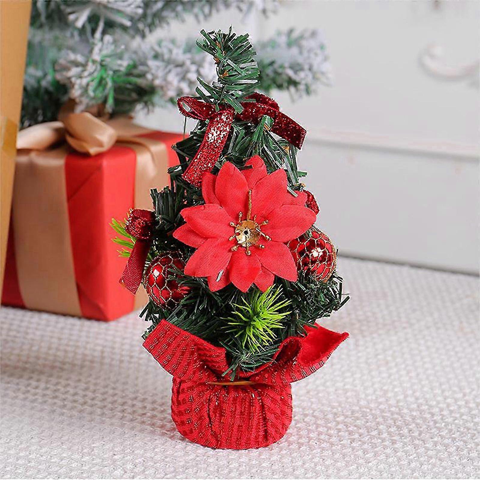 Tabletop Christmas tree with red ornaments for festive decor