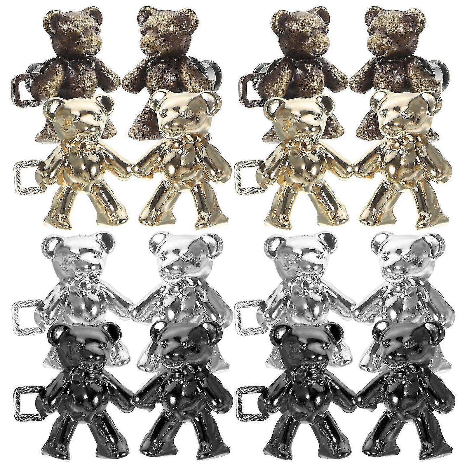 Pairs of buttons for jeans, waist adjusters with buckles.