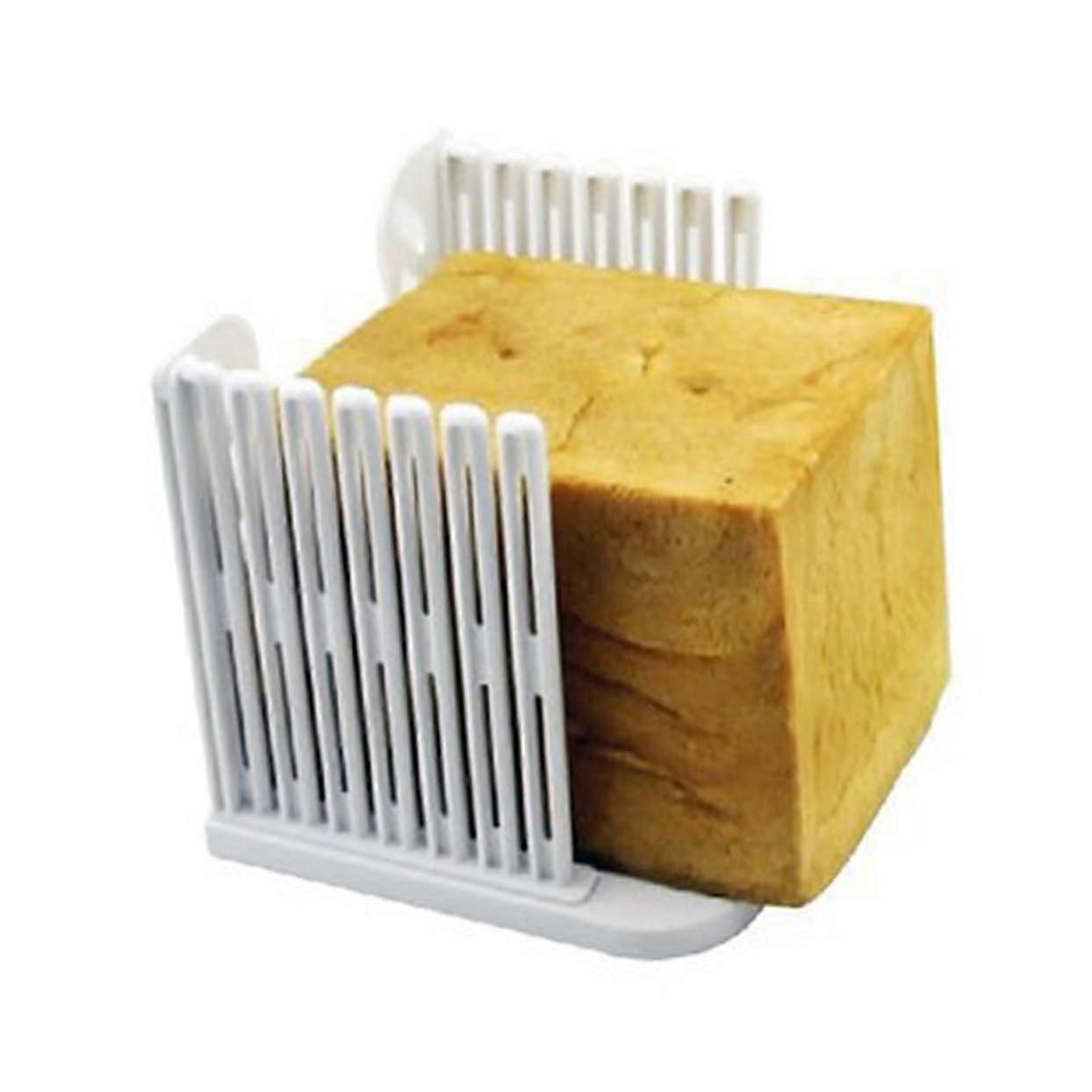 Foldable plastic toast cutter for precise, even sandwiches and spacesaving storage at home. Durable material.