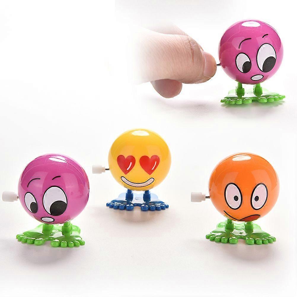 1 Pcs Wind up Face Colorful Funny Cartoon Somersault Running Clockwork Toys