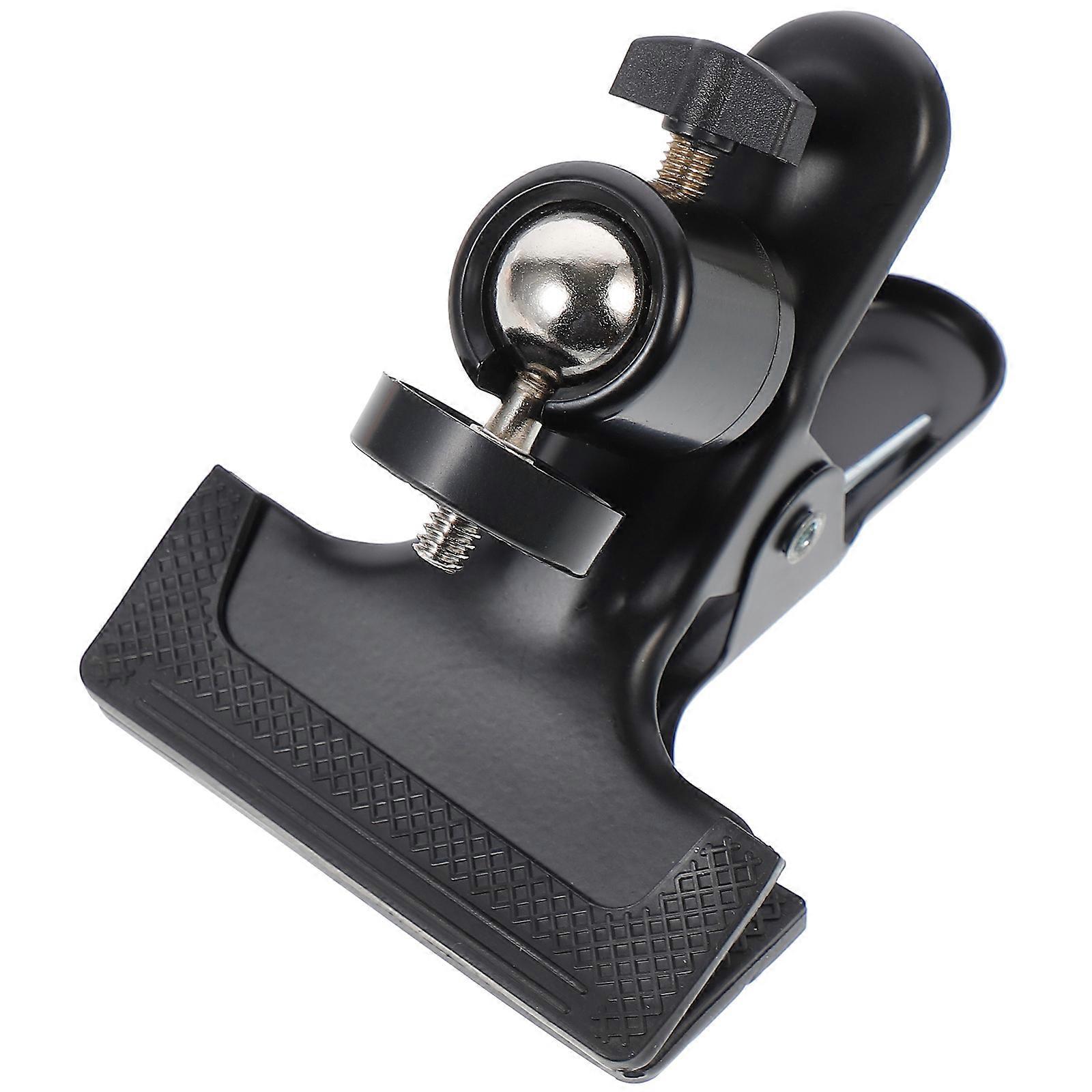 It sounds like you're referring to a **ball head mount** or a set of **durable spring clamps** commonly used in photography and studio setups. These