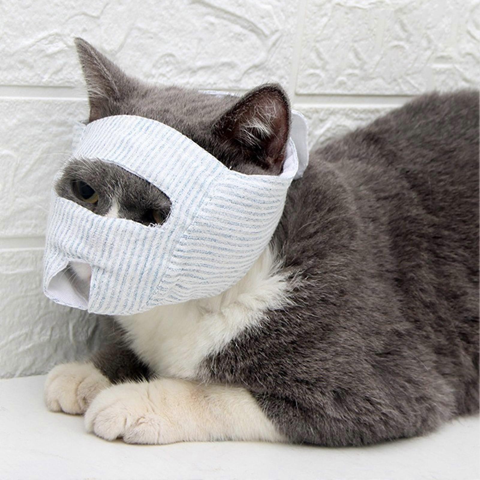 Cat muzzle with adjustable strap, breathable, bite-proof, odorless, perfect for grooming, bathing, and travel.