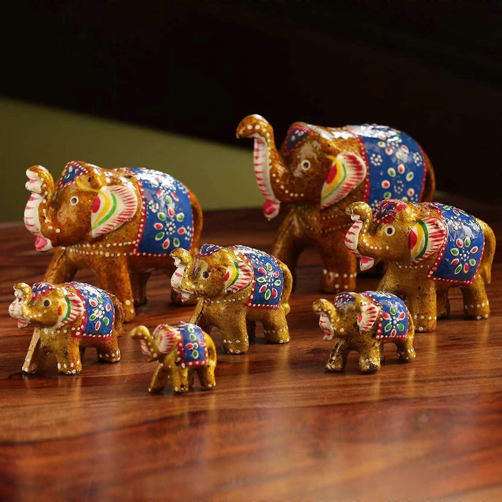 Elephant Sequence 7 Pieces Kanha Ji Pooja Room & Gifted Item For Home Decorative Showpiece - 10 cm  (Paper Mache, Gold)