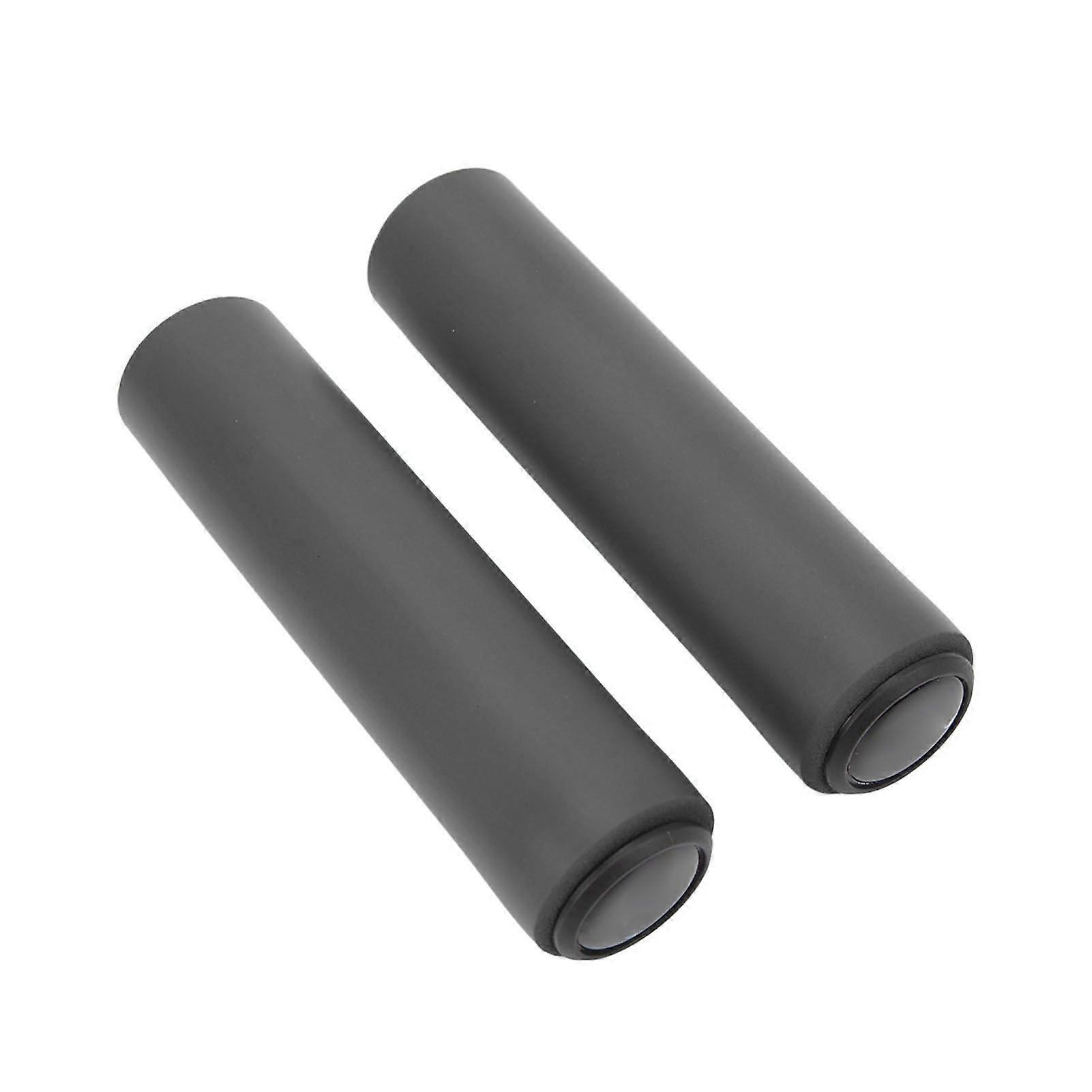 Soft, non-slip silicone grips for mountain bikes reduce hand fatigue and absorb shocks. PVC end cap, black.