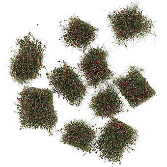 Conjunto de 10 enfeites de grama artificial em miniatura, na cor rosa.