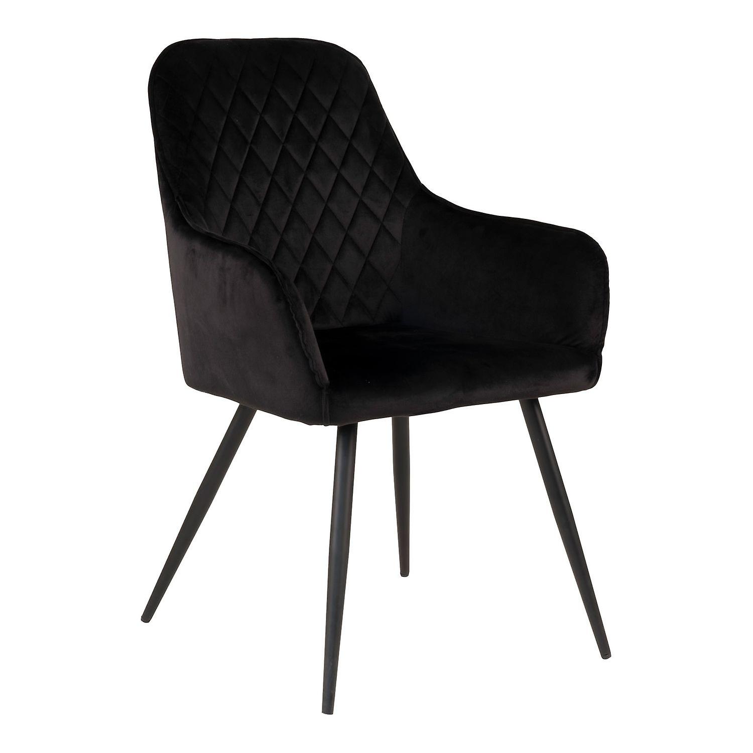 Dining room chair with black velvet armrests and black feet