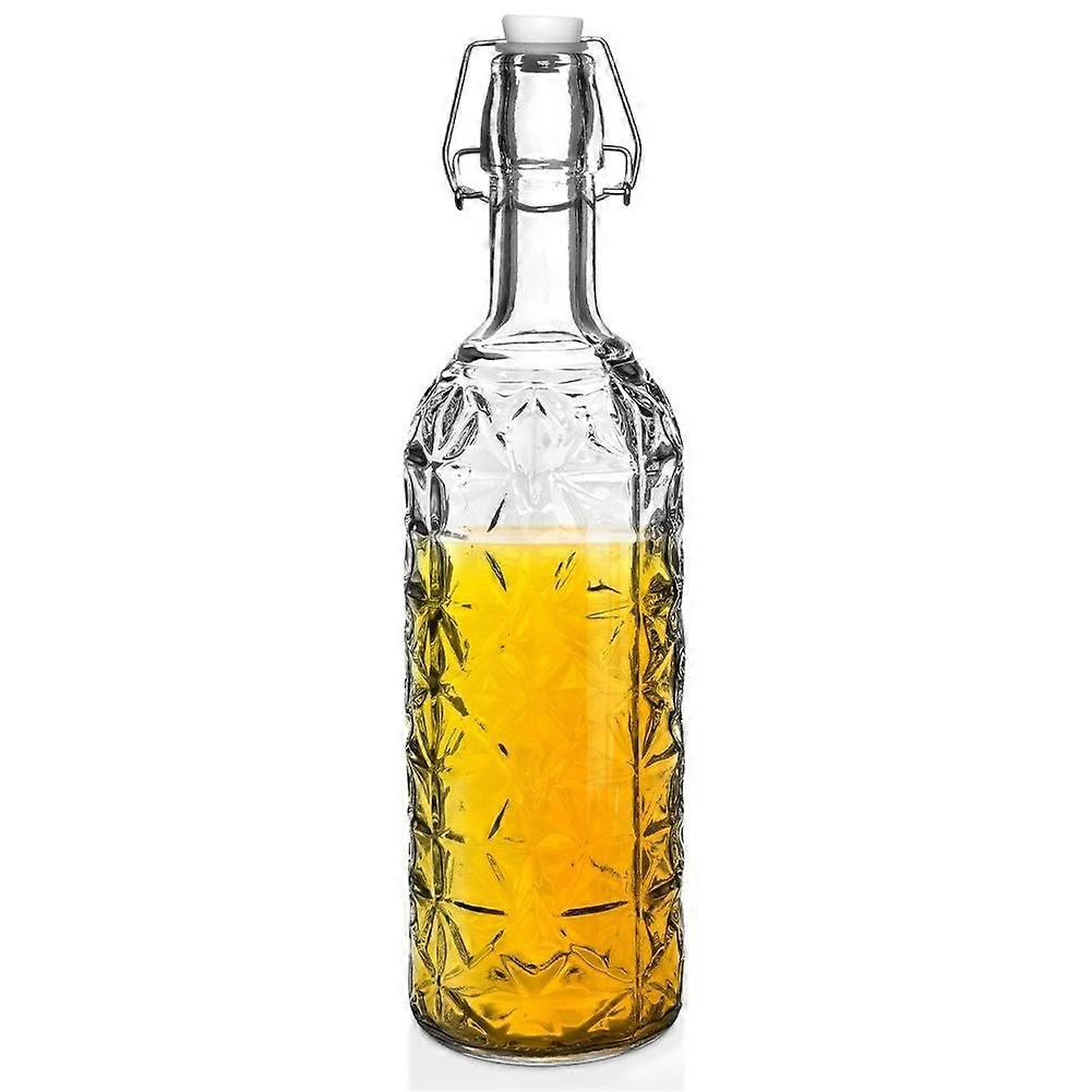 Beautiful glass bottle with cork and clip for drinks