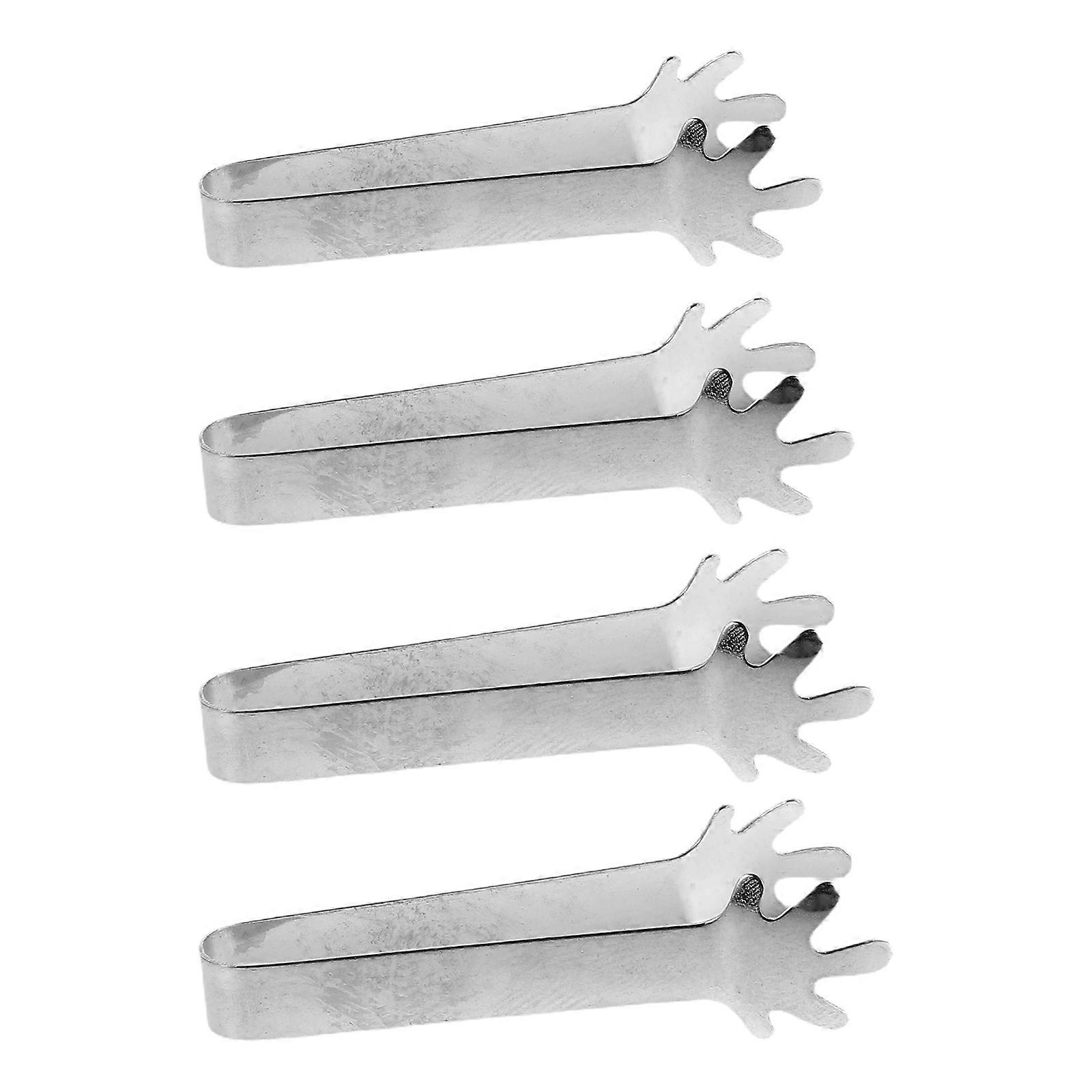 It seems you're referring to a product listing for **miniature dollhouse baking tongs**. These are typically used as **scale model accessories** for