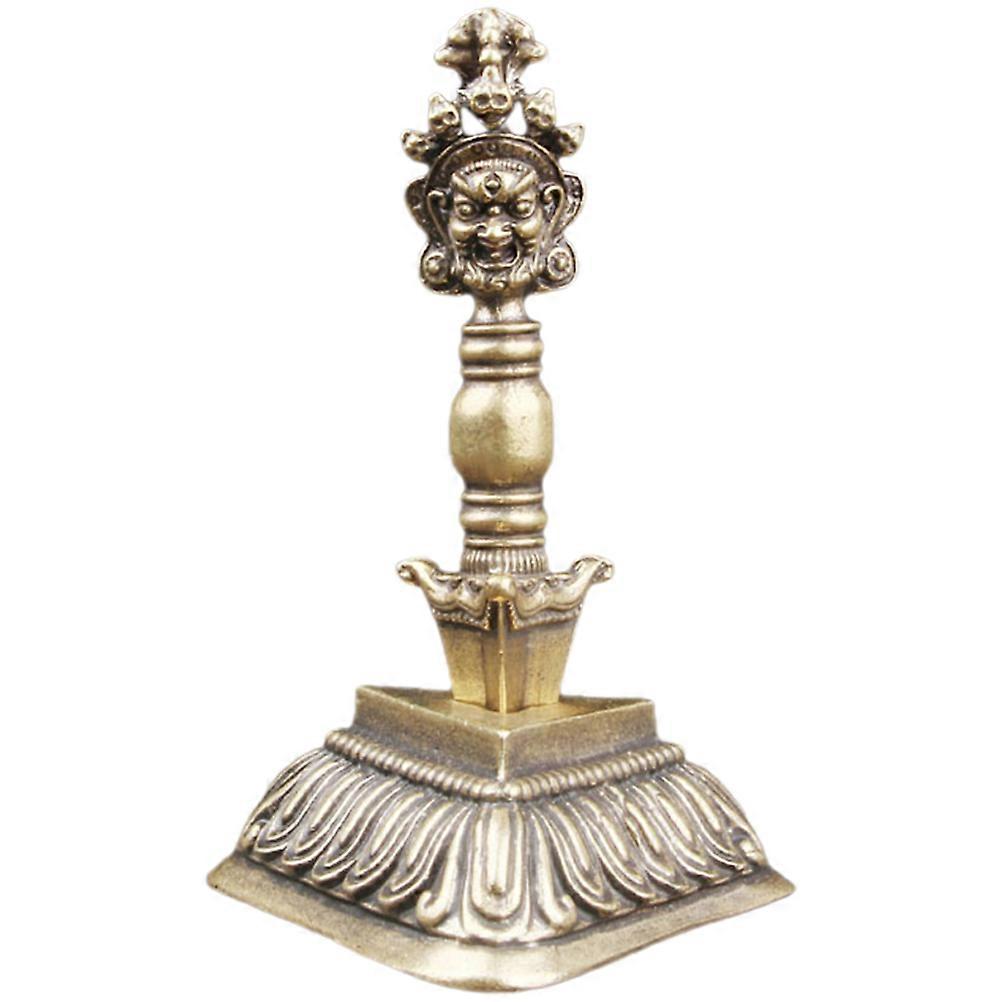 Ornement décoratif en métal doré à usage religieux.