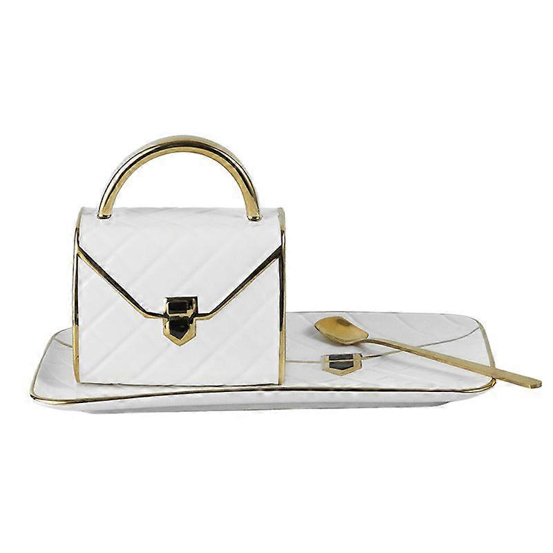 Gold painted coffee cup and saucer set creative bag shape