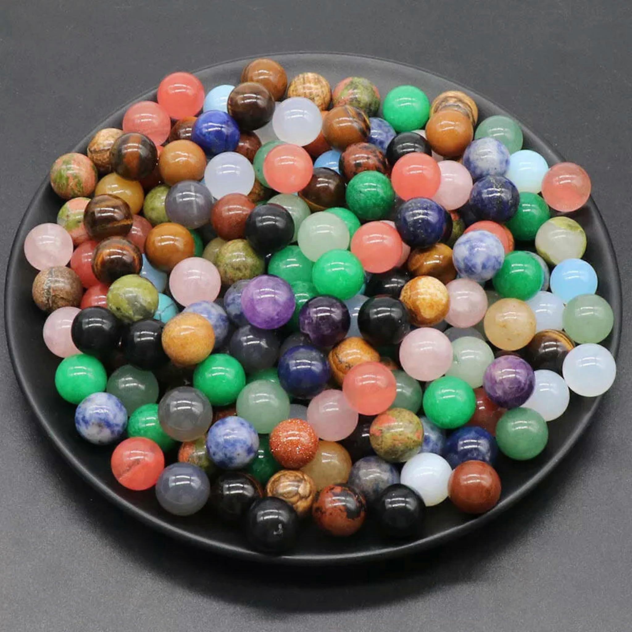 100 pieces of 12 mm mixed natural stone beads in round spherical shape without holes.