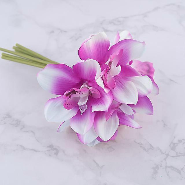 Branch of artificial flowers of white orchid with real touch