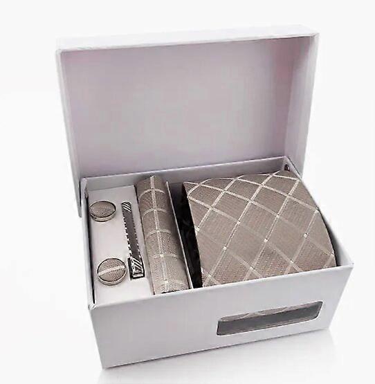 A gravata masculina, combinada com abotoaduras de 1,6 cm e lenço, vem com uma caixa de presente