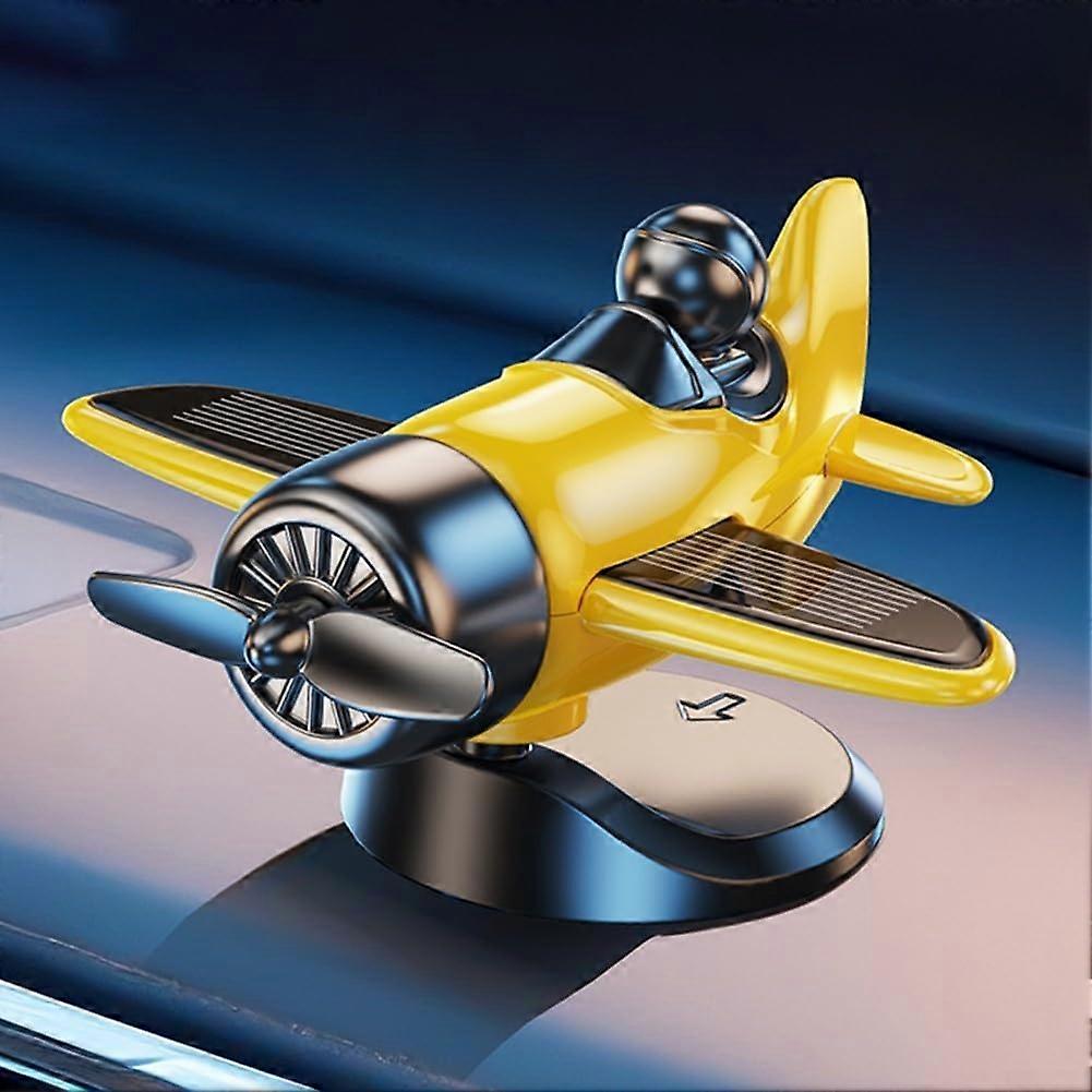 Solar Powered Rotating Fighter Plane Dashboard Ornament with LightActivated Propeller Spin Yellow