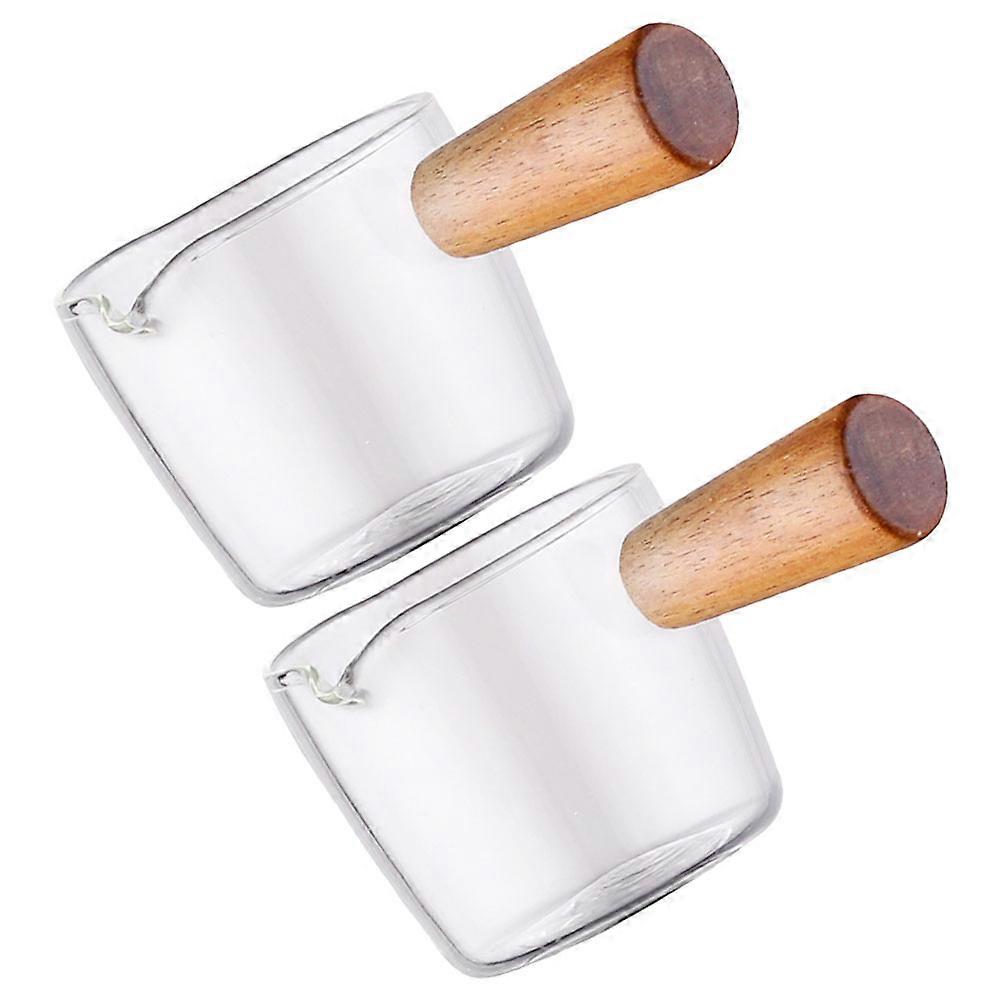 Here's a refined product description for your **2pcs Mini Glass Milk Pitcher Set**:
### 2pcs Mini Glass Milk Pitcher Set with Handle – Versatile