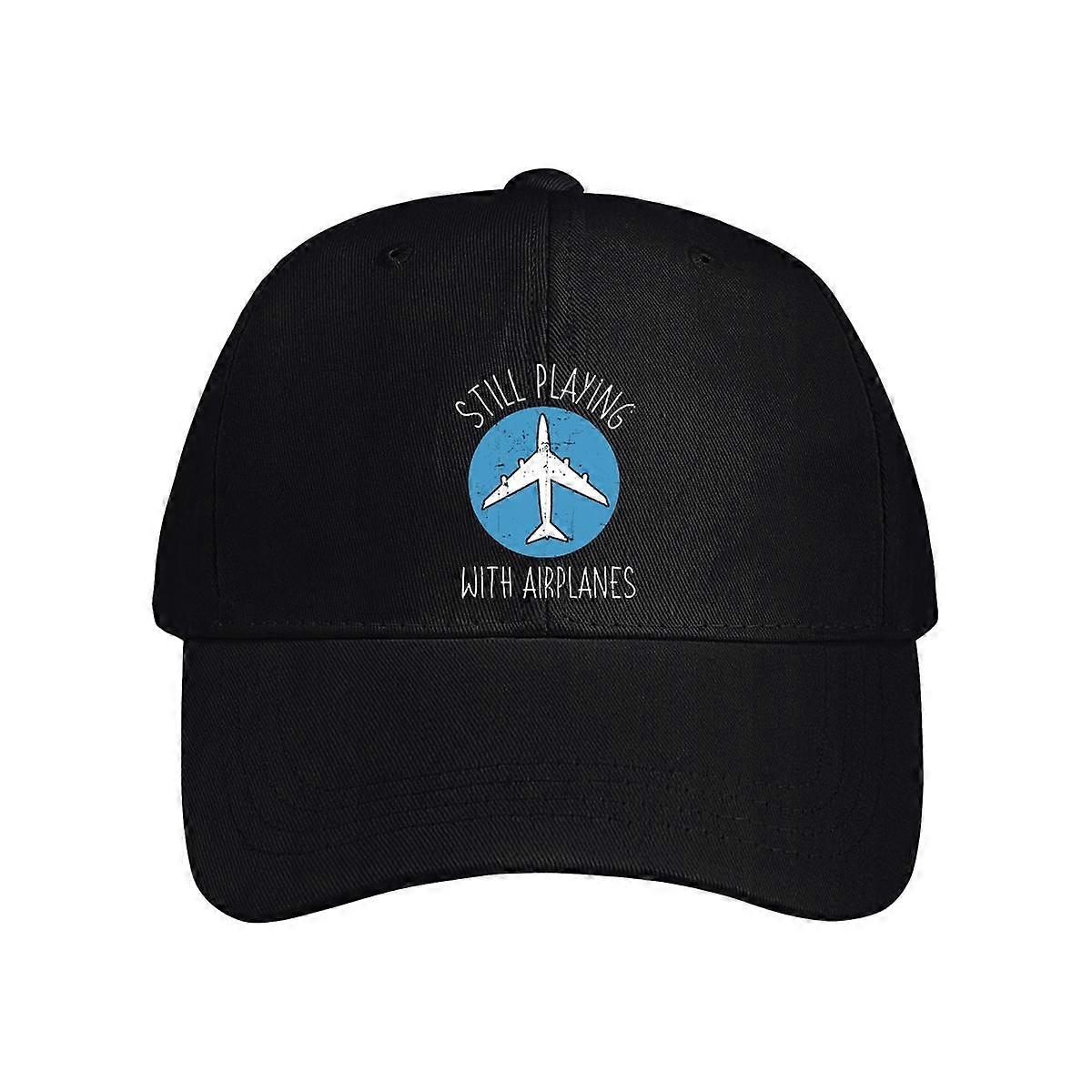 Leker fortsatt med baseballcaps for fly