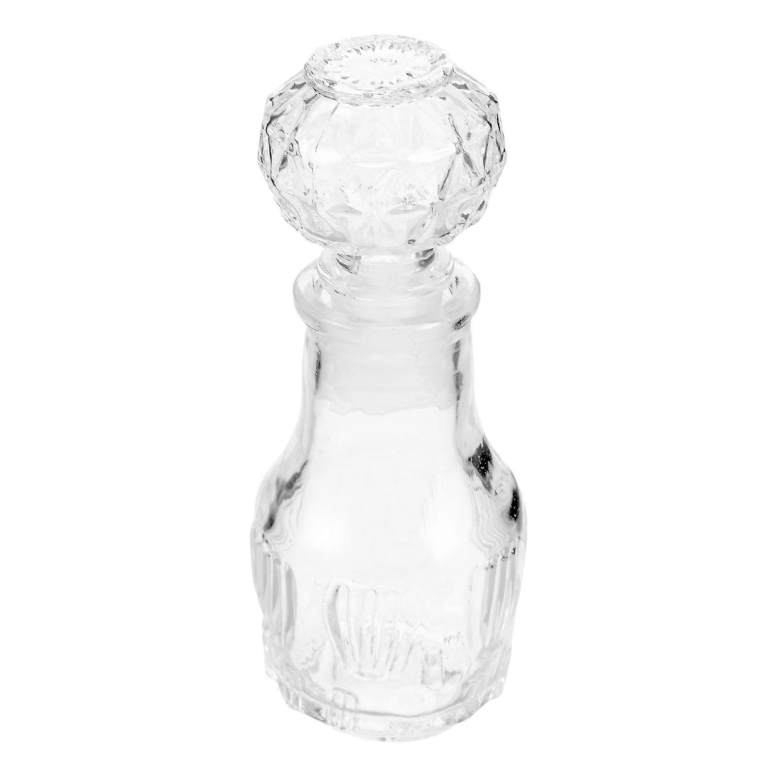 Here's a polished and engaging product description based on the title you provided:
**Vintage Glass Perfume Bottle – Small Opening Retro Design |
