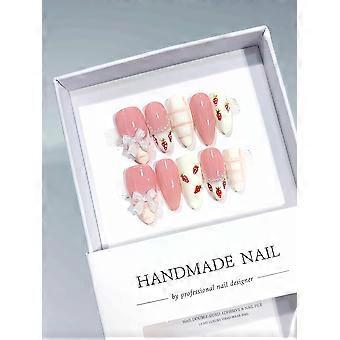 Korta mandelfärgade press-on naglar i rosa och vitt jordgubbsmönster med 3D-strass rosett, handgjort set, 10 st.