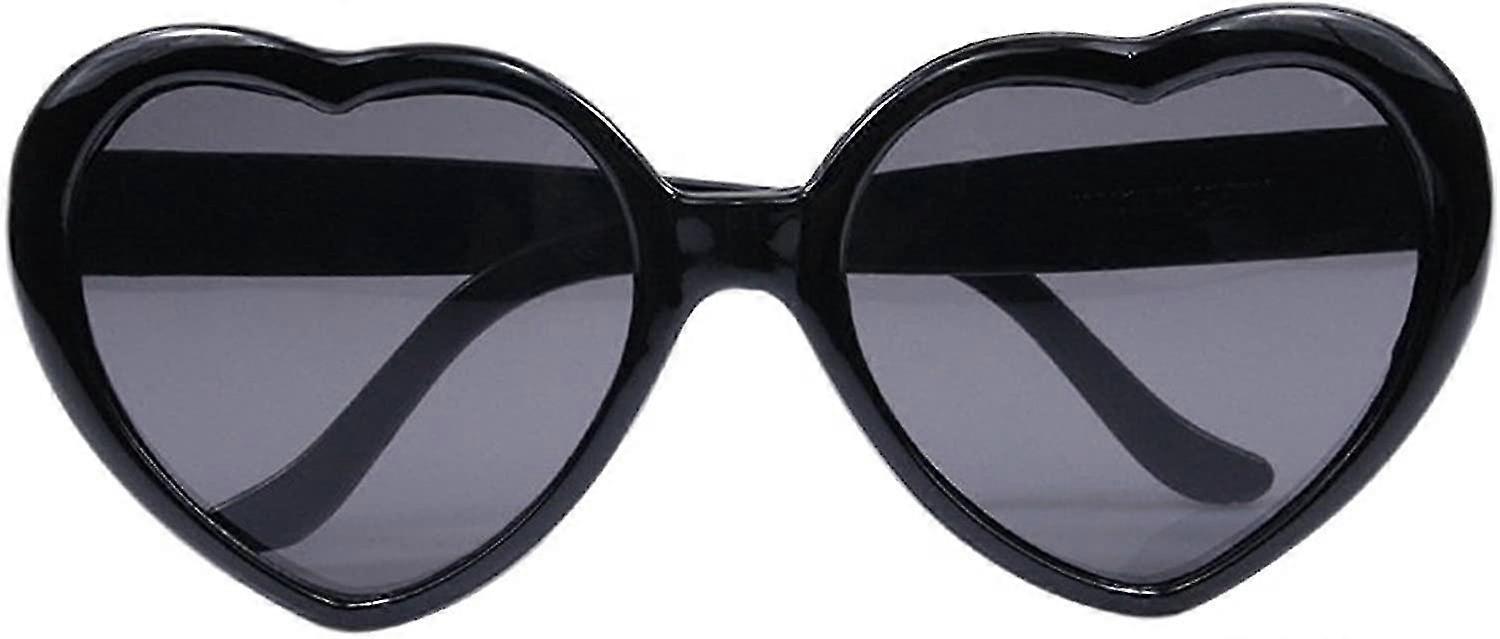 Women's super large heart shaped retro sunglasses.