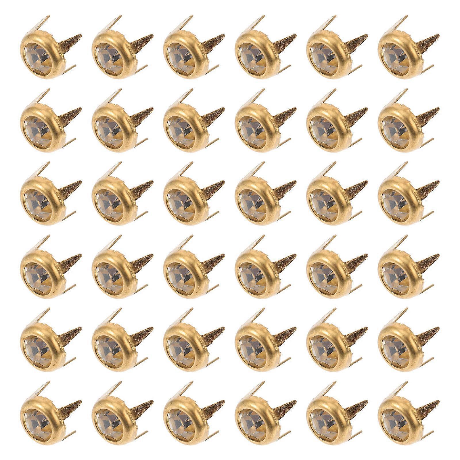 Kultaiset kupari- ja lasiniitit 50 kpl koriste-askarteluun ja tee-se-itse-tarvikkeisiin