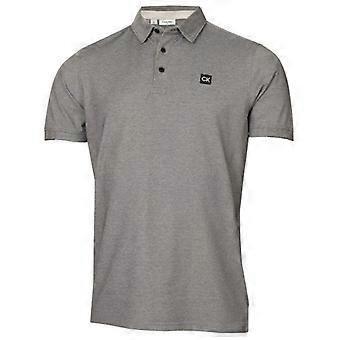 Camisa polo Calvin Klein para hombre con parche, corte regular.