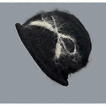 Autumn and winter jacquard bow pulled hair pile hat women's warm ear protector head cold hat casual fashion knitted hat