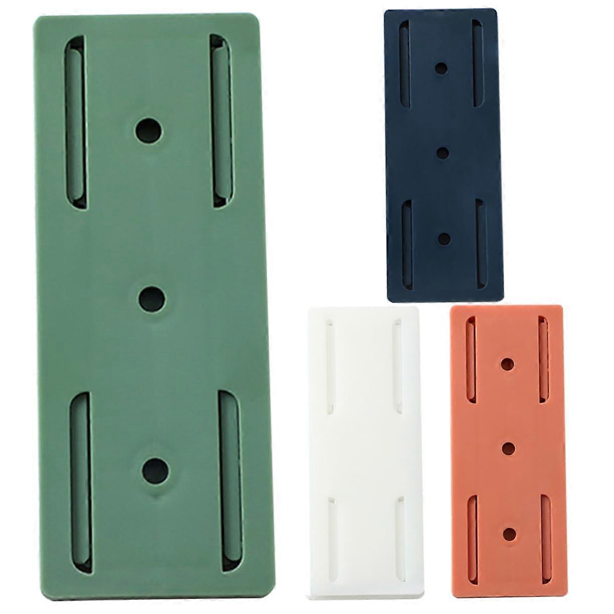 4 Pieces SelfAdhesive Wall Mounts for Outlets, Practical Socket Holder for Installation on Walls in Kitchen, Office, and Home, Color Sorted Green