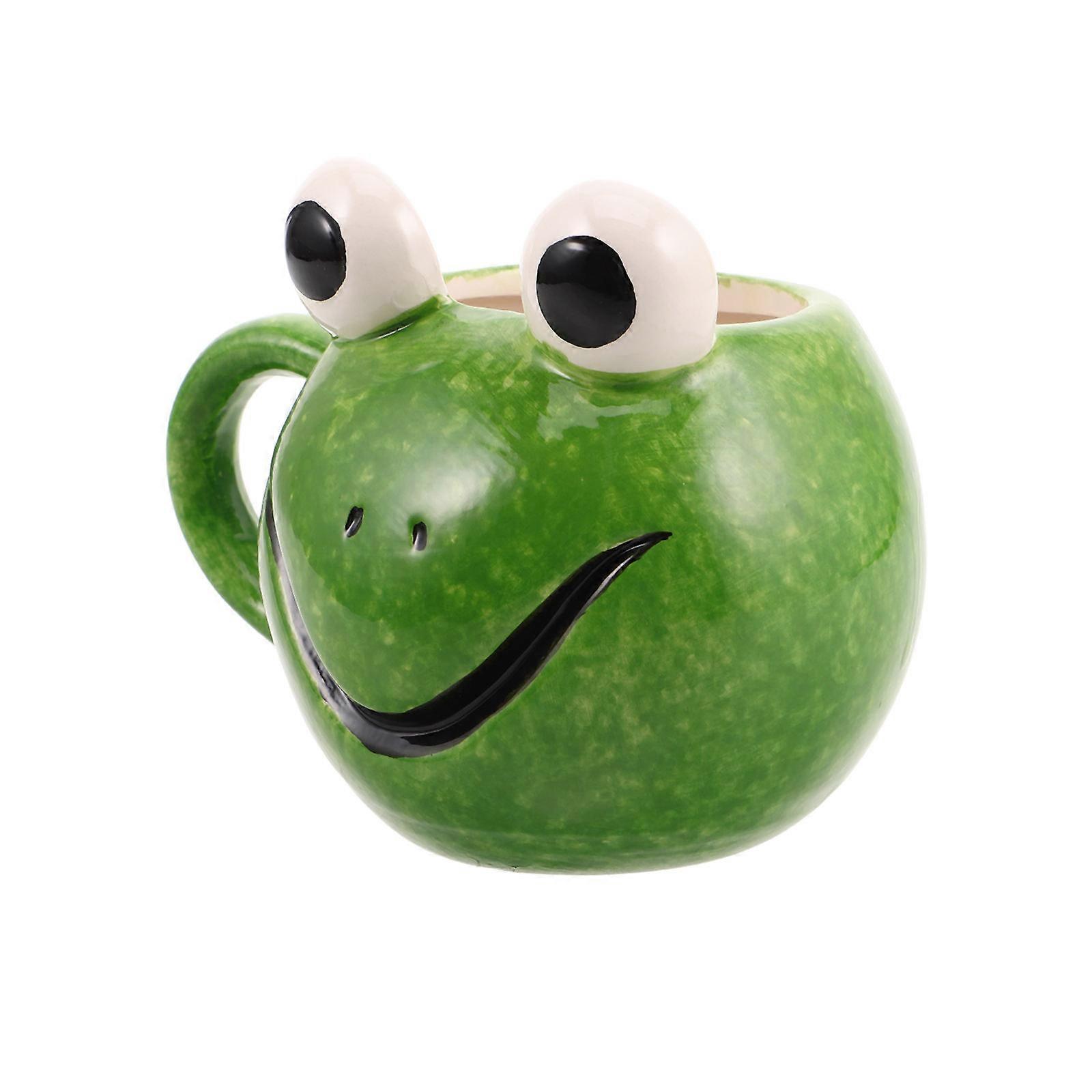 Here's a polished and engaging product description for your **Cute Frog Shaped Ceramic Mug**:
**Cute Frog Shaped Ceramic Mug – Whimsical Cartoon
