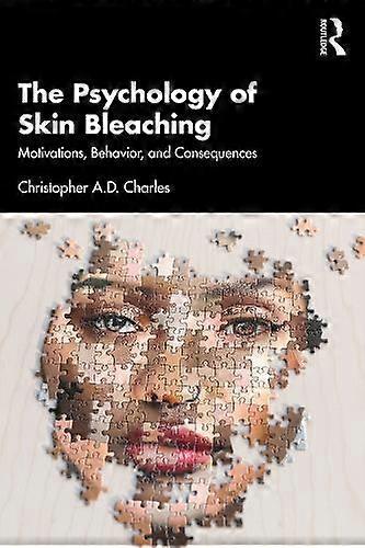 The Psychology Of Skin Bleaching by Christopher A.D. Charles Paperback