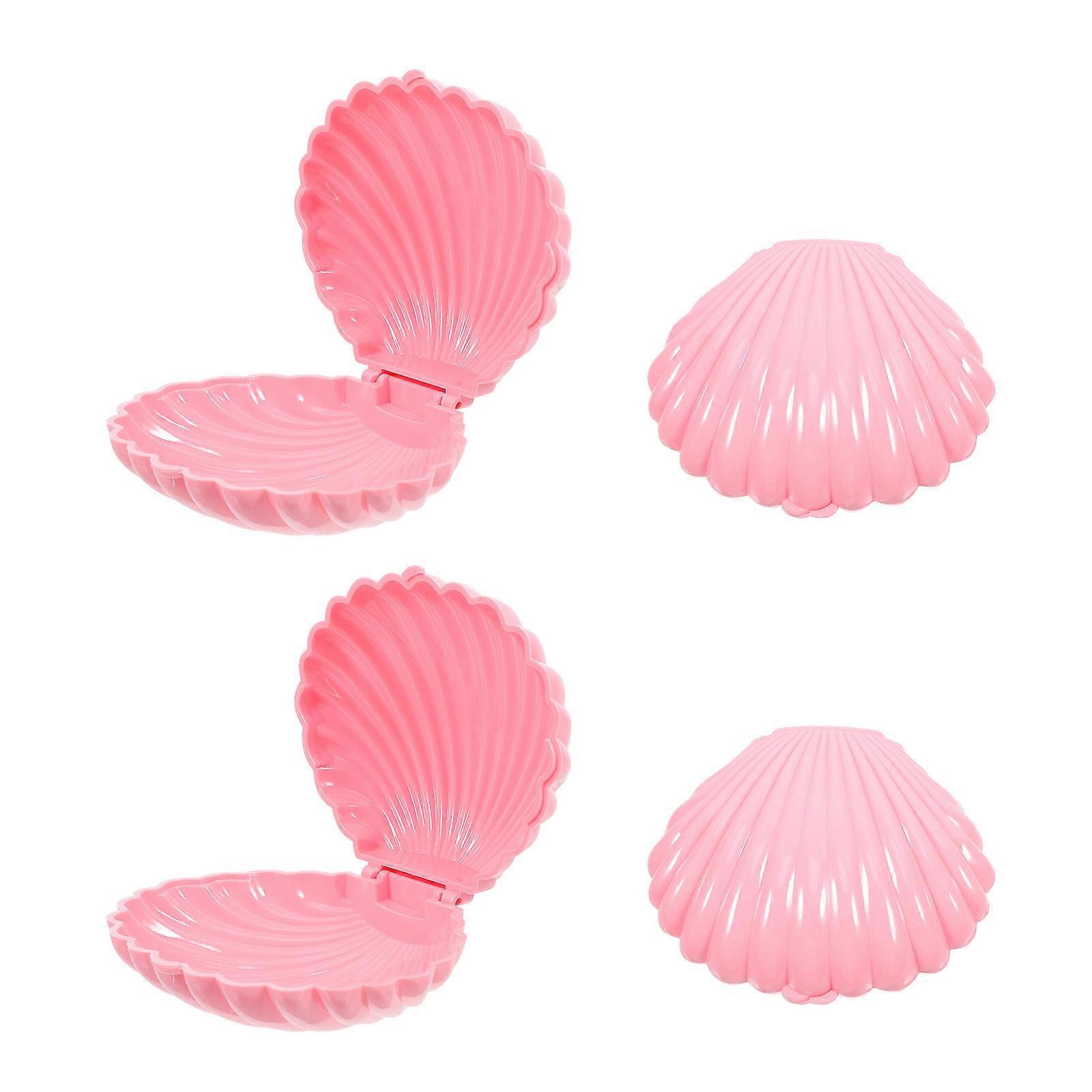 Seashell storage boxes, especially pink shell shaped containers, are popular for their charming, decorative appeal and versatility for events like